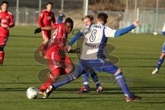 2. BL - Testspiel - FC Ingolstadt 04 - FC Carl Zeiss Jena - 2013/2014 - links Reagy Baah Ofosu (23) gegen rechts Mathias Peßolat