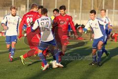 2. BL - Testspiel - FC Ingolstadt 04 - FC Carl Zeiss Jena - 2013/2014 - Gerangel um den Ball vor dem Jena Tor, links Philipp Hofmann (28), und Andre Mijatović (4)