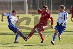 2. BL - Testspiel - FC Ingolstadt 04 - FC Carl Zeiss Jena - 2013/2014 - mitte FC Konstantin Engel (22) wird von links Florian Giebel (J) gestoppt