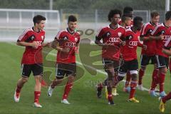 2. BL - FC Ingolstadt 04 - Saison 2013/2014 - Trainingsauftakt - Laufen bei vollem Regen, links Alfredo Morales