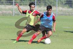 2. BL - FC Ingolstadt 04 - Saison 2013/2014 - Neuzugang Almog Cohen beim 1. Training im Zweikampf mit Alfredo Morales (6)