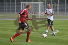 2. BL - FC Ingolstadt 04 - Saison 2013/2014 - Trainingsauftakt - Cheftrainer Marco Kurz auf dem Trainingsplatz gibt Anweisungen