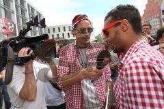 FC Ingolstadt 04 - Meisterfeier - Bundesliga Aufstieg - voller Rathausplatz - Stimmung - Fans - Benjamin Hübner (5, FCI) und Marvin Matip (34, FCI) machen Interviews für Sky