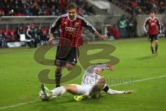 2. BL - FC Ingolstadt 04 - FC St. Pauli - Lukas Hinterseer (16) stürmt zum Tor und wird von Sören Gonther gestoppt