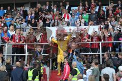 2. Bundesliga - Fußball - FC Ingolstadt 04 - RB Leipzig - Spiel ist aus Sieg Aufstieg in die 1. BL, Fans auf den Spielfeld, Spieler feiern, Meisterschale Balkon im Sportpark Torwart Ramazan Özcan (1, FCI) am Mikrofon