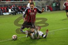 2. BL - FC Ingolstadt 04 - FC St. Pauli - Lukas Hinterseer (16) stürmt zum Tor und wird von Sören Gonther gestoppt