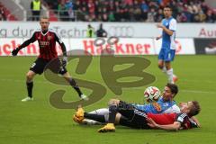 2. Bundesliga - FC Ingolstadt 04 - VfL Bochum - vorne rechts Lukas Hinterseer (16) wird zu Boden gebracht, links lauert Moritz Hartmann (9)