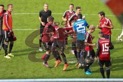 2. Bundesliga - FC Ingolstadt 04 - Eintracht Braunschweig - Lukas Hinterseer (16) sing die Fans zum HUMBA auf der Fankurve Jubel Sieg Megaphon Tanz