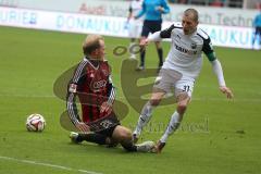 2. Bundesliga - Fußball - FC Ingolstadt 04 - SV Sandhausen - Tobias Levels (28, FCI) trifft Stefan Kulovits am Fuss und bekommt dafür Gelb