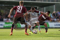 2. Bundesliga - Testspiel - FC Ingolstadt 04 - 1. FC Nürnberg 2:1 - Karl-Heinz Lappe (25) wird vor dem Tor bedrängt von Petrak 31