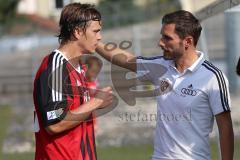 Regionalliga Bayern - FC Ingolstadt 04 II - TSV Buchbach 1:1 - Marcel Hagmann (23), Cheftrainer Stefan Leitl und Andreas Buchner (16) diskutieren in der Halbzeitpause