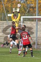 Regionalliga Bayern - FC Ingolstadt 04 II - FC Memmingen - links Julian Günther-Schmidt (13) und rechts Marcel Hagmann (23) kommen zu spät. Torwart Memmingen Martin Gruber fängt den Ball