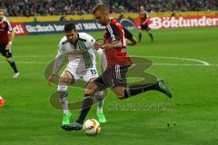 1. Bundesliga - Fußball - Borussia Mönchengladbach - FC Ingolstadt 04 -Lukas Hinterseer (16, FCI) gegen Alvaro Dominguez (15, Mönchengladbach). Foto: Adalbert Michalik