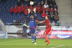 1. BL - Saison 2015/2016 - Hannover 96 - FC Ingolstadt 04 - Ramazan Özcan (#1 FC Ingolstadt 04) - Artur Sobiech (#9 Hannover) - Foto: Jürgen Meyer