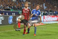 1. BL - Saison 2015/2016 - Schalke 04 - FC Ingolstadt 04 -  Lukas Hinterseer (#16 FC Ingolstadt 04) - Benedikt Höwedes (4, Schalke) - Foto: Jürgen Meyer