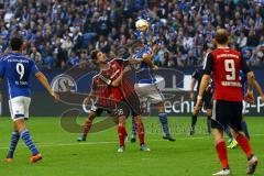1. Bundesliga - Fußball - FC Schalke 04 - FC Ingolstadt 04 - Romain Brégerie (18, FCI) gewinnt das Kopfballduell gegen Sead Kolasinac (6, Schalke). Foto: Adalbert Michalik