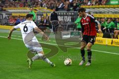 1. Bundesliga - Fußball - Borussia Mönchengladbach - FC Ingolstadt 04 - Mathew Leckie (7, FCI) im Zweikampf gegen Havard Nordtveit (6, Mönchengladbach). Foto: Adalbert Michalik