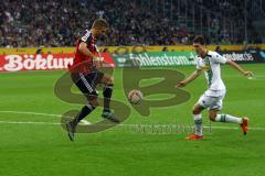 1. Bundesliga - Fußball - Borussia Mönchengladbach - FC Ingolstadt 04 - Lukas Hinterseer (16, FCI) gegen Andreas Christensen (3, Mönchengladbach). Foto: Adalbert Michalik