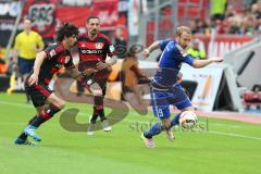 1. Bundesliga - Fußball - Bayer 04 Leverkusen - FC Ingolstadt 04 - Ramalho, André (Leverkusen 2) Hilbert, Roberto (Leverkusen 13) und Moritz Hartmann (9, FCI) am Ball