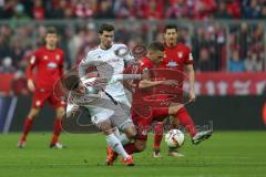 1. Bundesliga - Fußball - FCBayern - FC Ingolstadt 04 - Zweikampf links Stefan Lex (14, FCI) gegen rechts Joshua Kimmich (32 Bayern) hinten Pascal Groß (10, FCI)