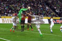 1. Bundesliga - Fußball - Borussia Mönchengladbach - FC Ingolstadt 04 - Danilo Soares Teodoro (15, FCI)  und Benjamin Hübner (5, FCI) versuchen vor Yann Sommer (1, Mönchengladbach) an den Ball zu kommen. Foto: Adalbert Michalik