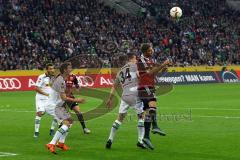 1. Bundesliga - Fußball - Borussia Mönchengladbach - FC Ingolstadt 04 - Lukas Hinterseer (16, FCI) gewinnt das Kopfballduell gegen Granit Xhaka (34, Mönchengladbach). Foto: Adalbert Michalik