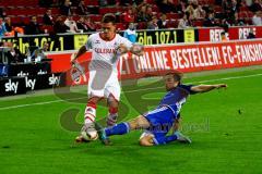 1. Bundesliga - Fußball - 1. FC Köln - FC Ingolstadt 04 -  Markus Suttner (29, FCI)  grätscht Simon Zoller (11,FCKöln) den Ball weg. Foto: Adalbert Michalik