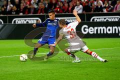 1. Bundesliga - Fußball - 1. FC Köln - FC Ingolstadt 04 - Stefan Lex (14, FCI) spielt Matthias Lehmann aus. (33, FCKöln) Foto: Adalbert Michalik