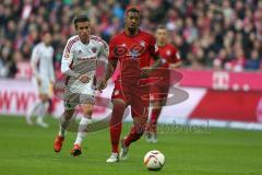 1. Bundesliga - Fußball - FCBayern - FC Ingolstadt 04 - Jerome Boateng (17 Bayern) und links Stefan Lex (14, FCI)