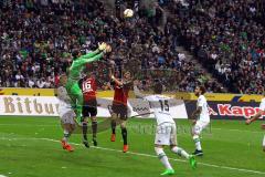 1. Bundesliga - Fußball - Borussia Mönchengladbach - FC Ingolstadt 04 - Danilo Soares Teodoro (15, FCI)  und Benjamin Hübner (5, FCI) versuchen vor Yann Sommer (1, Mönchengladbach) an den Ball zu kommen. Foto: Adalbert Michalik