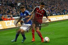 1. Bundesliga - Fußball - FC Schalke 04 - FC Ingolstadt 04 - Benjamin Hübner (5, FCI)  gewinnt den Zweikampf gegen Junior Caicara (3, Schalke). Foto: Adalbert Michalik