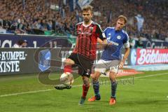 1. BL - Saison 2015/2016 - Schalke 04 - FC Ingolstadt 04 -  Lukas Hinterseer (#16 FC Ingolstadt 04) - Benedikt Höwedes (4, Schalke) - Foto: Jürgen Meyer