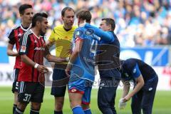 1. Bundesliga - Fußball - TSG 1899 Hoffenheim - FC Ingolstadt 04 - Benjamin Hübner (5, FCI) und Ermin Bicakcic (TSG 4) stoßen zusammen und Ermin Bicakcic (TSG 4) erleidet eine Platzwunde