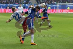 1. Bundesliga - Fußball - Hamburger SV - FC Ingolstadt 04 - Ostrzolek, Matthias (22 HSV) und Pascal Groß (10, FCI) hohes Bein