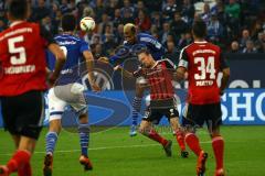 1. Bundesliga - Fußball - FC Schalke 04 - FC Ingolstadt 04 - Tobias Levels (28, FCI)  wird von EricMaxim Choupo-Moting (13, Schalke) unfair angegangen. Foto: Adalbert Michalik