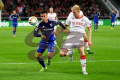 1. Bundesliga - Fußball - 1. FC Köln - FC Ingolstadt 04 - Stefan Lex (14, FCI) mit Frederik Sörensen (4,Köln) im Kampf um den Ball. Foto: Adalbert Michalik