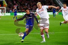 1. Bundesliga - Fußball - 1. FC Köln - FC Ingolstadt 04 - Stefan Lex (14, FCI) mit Frederik Sörensen (4,Köln) im Kampf um den Ball. Foto: Adalbert Michalik