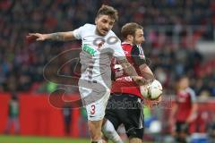 1. Bundesliga - Fußball - FC Ingolstadt 04 - FC Augsburg - Stafylidis, K. (FCA 3) und Moritz Hartmann (9, FCI)