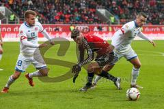 1. Bundesliga - Fußball - FC Ingolstadt 04 - 1. FSV Mainz 05 - mitte Mathew Leckie (7, FCI) links Brosinski, Daniel (Mainz 18) und rechts Clemens, Christian (Mainz 27)