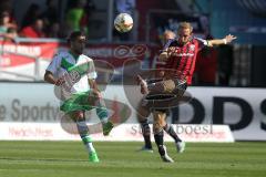 1. Bundesliga - Fußball - FC Ingolstadt 04 - VfL Wolfsburg -  Ricardo Rodríguez (Wolfsburg 34) und Moritz Hartmann (9, FCI)