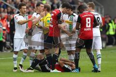 1. BL - Saison 2015/2016 - FC Ingolstadt 04 - Borussia Mönchengladbach - Lezano Farina,Dario (#37 FC Ingolstadt 04)  verletzt am Boden - Roger de Oliveira Bernardo (#8 FC Ingolstadt 04) - Benjamin Hübner (#5 FC Ingolstadt 04) - Foto: Meyer Jürgen