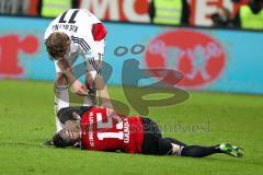 1. BL - Saison 2015/2016 - FC Ingolstadt 04 - Bayer 04 Leverkusen - Danilo Soares Teodoro (#15 FC Ingolstadt 04) verletzt am Boden - Kießling Stefan #11 weiss Leverkusen - Foto: Meyer Jürgen