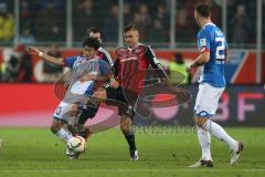 1. Bundesliga - Fußball - FC Ingolstadt 04 - TSG Hoffenheim - Kim, Jin-Su (TSG 20) und Lukas Hinterseer (16, FCI)