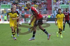 1. Bundesliga - Fußball - FC Ingolstadt 04 - Borussia Dortmund - mitte Lukas Hinterseer (16, FCI) links Marcel Schmelzer (BVB 29)