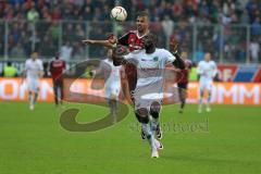 1. Bundesliga - Fußball - FC Ingolstadt 04 - Hannover 96 - Salif Sané (Hannover 5) und hinten Lukas Hinterseer (16, FCI)