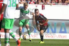 1. Bundesliga - Fußball - FC Ingolstadt 04 - VfL Wolfsburg -  André Schürrle (Wolfsburg 17) und rechts Pascal Groß (10, FCI)