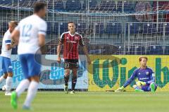 1. Bundesliga - Fußball - Testspiel - SV Grödig - FC Ingolstadt 04 - 1:0 - links Torwart Örjan Haskjard Nyland (26, FCI) kann den Ball nicht festhalten und Roman Wallner trifft zum 1:0 Tor, Robert Bauer (23, FCI)