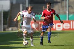 DFB-Pokal - 1. Runde - Fußball - FC Ingolstadt 04 - SpVgg Unterhaching - links Moritz Hartmann (9, FCI) rechts Alexander Winkler (UHG)