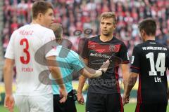 1. Bundesliga - Fußball - 1. FC Köln - FC Ingolstadt 04 - Lukas Hinterseer (16, FCI) wird vom Schiedsrichter ermahnt