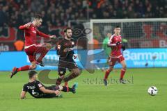 1. Bundesliga - Fußball - Bayer Leverkusen - FC Ingolstadt 04 - Pascal Groß (10, FCI) springt über Aleksandar Dragovic (Leverkusen 6)